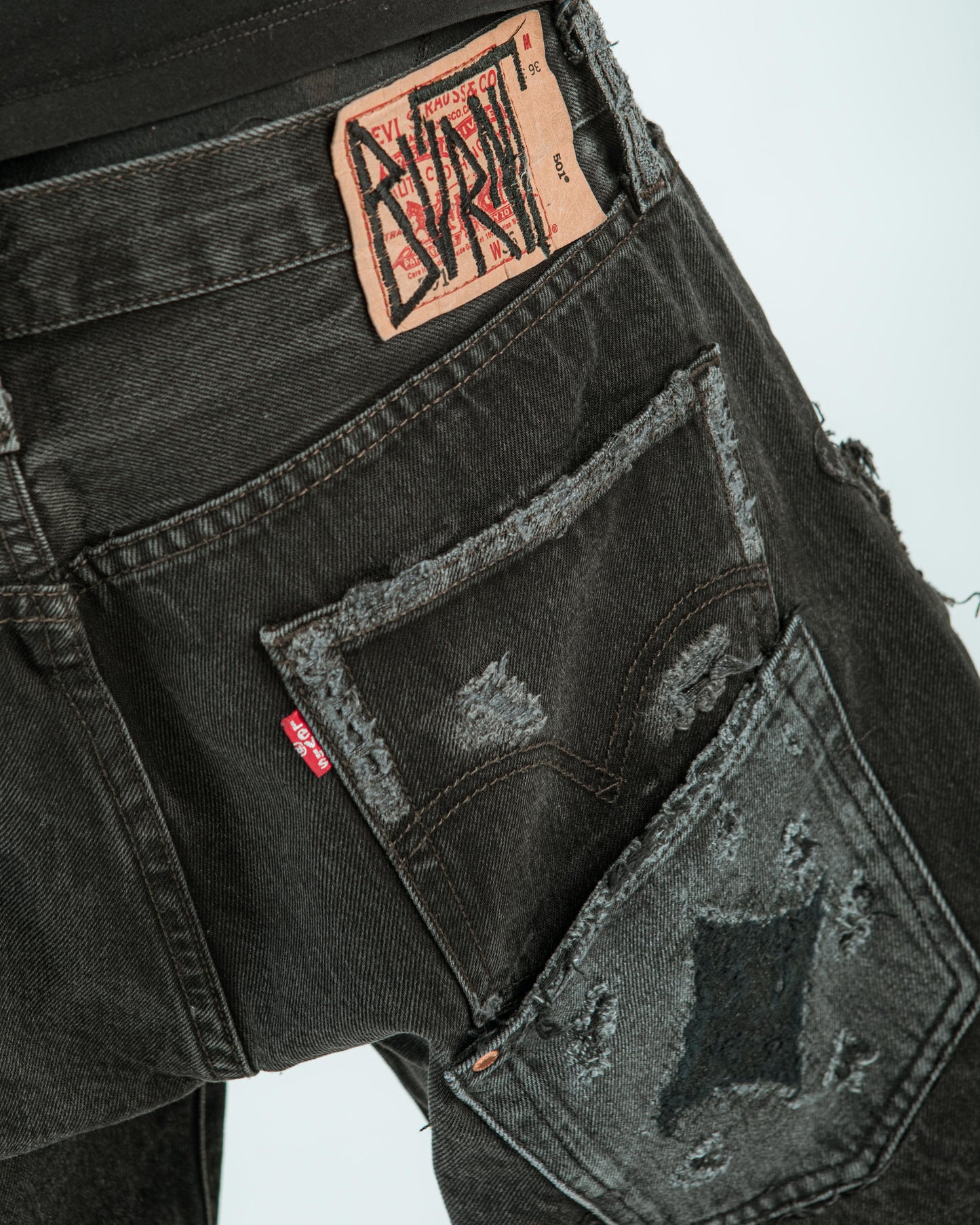 “ORANGE IS BLACK” DISTRESSED JORTS