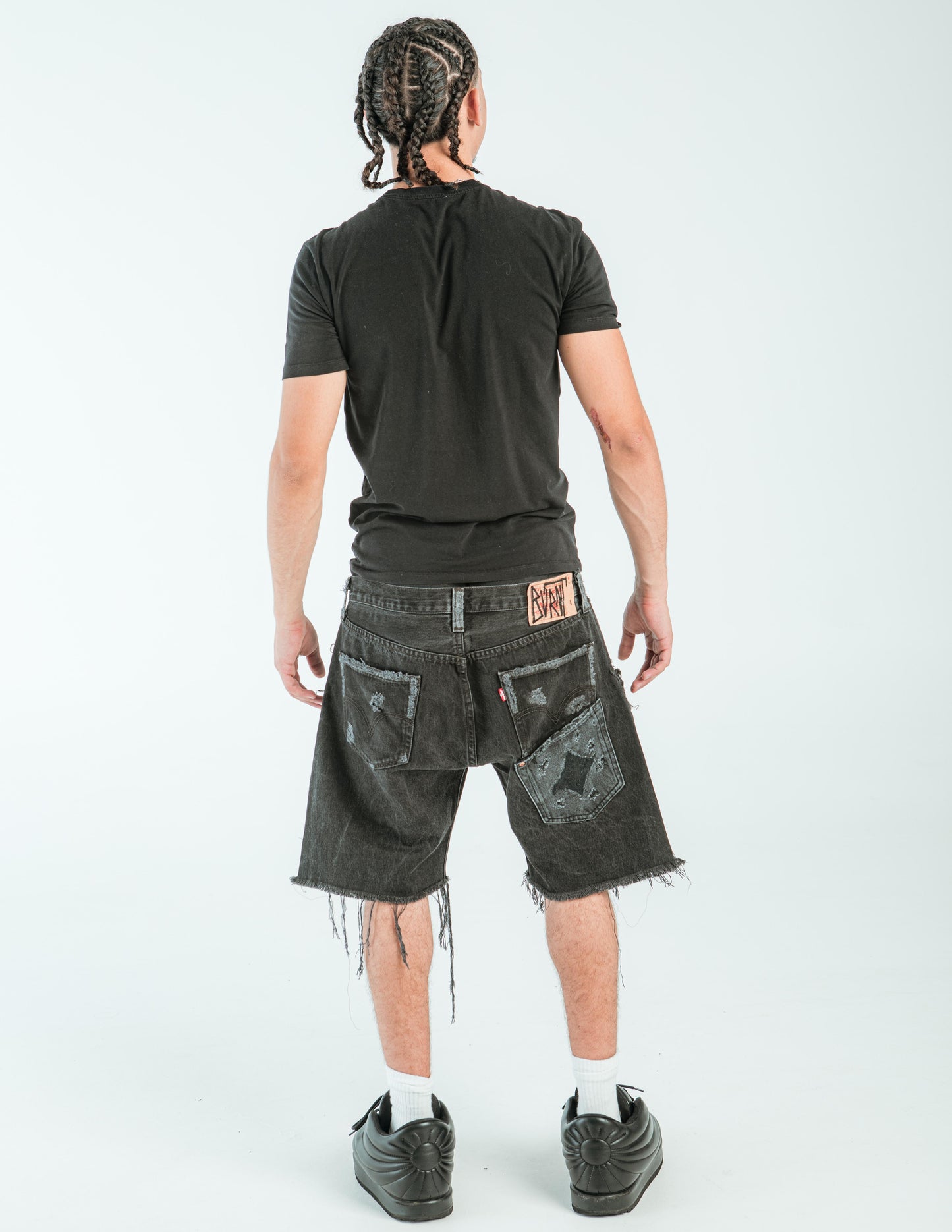 “ORANGE IS BLACK” DISTRESSED JORTS