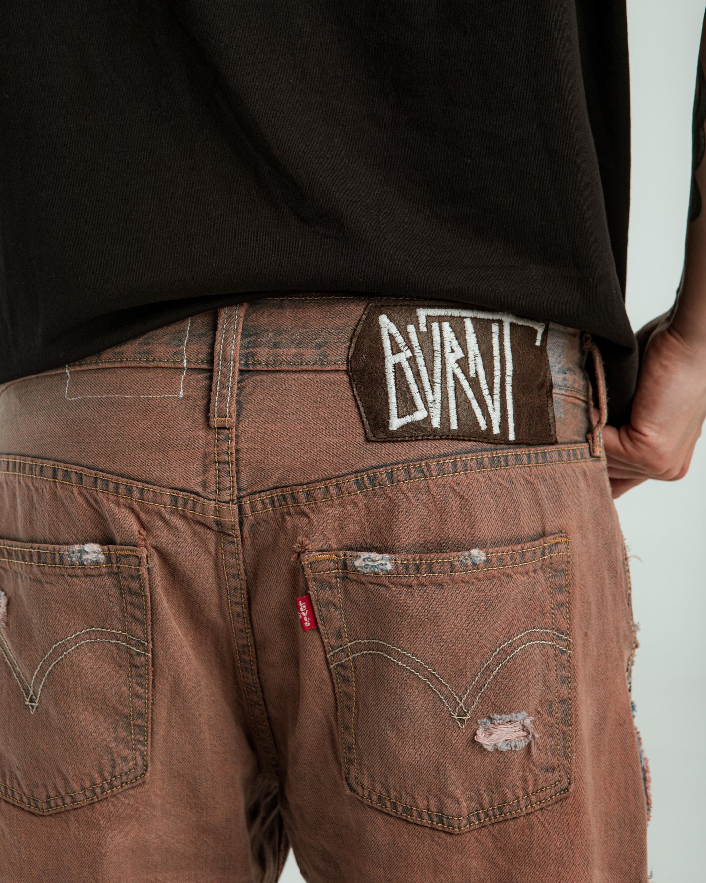 “RUST WASH” DISTRESSED JORTS