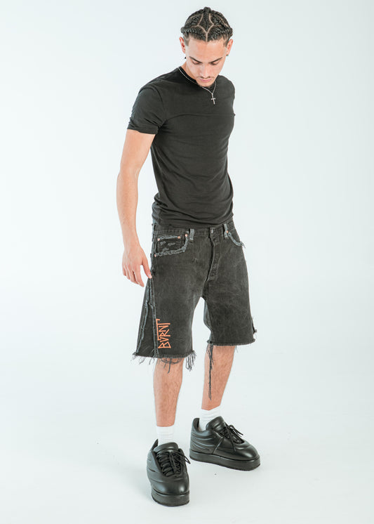 “ORANGE IS BLACK” DISTRESSED JORTS